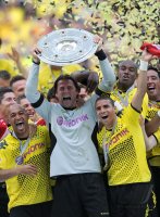 Fussball 1. Bundesliga :  Dede, Torwart Roman Weidenfeller, Mohamed Zidan, Felipe Santana  (v. li., Borussia Dortmund)