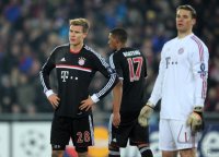 Fussball CHL  Saison 2011/2012: Holger Badstuber, Jerome Boateng, Torwart Manuel Neuer (v.li., FC Bayern Muenchen)