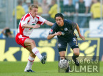 Fussball 1. Bundesliga: Koeln - Wolfsburg, Zweikampf