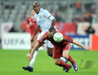 FUSSBALL INTERNATIONAL  CHL Viertelfinale 11/12: Charles Kabore (li, Olympique Marseille) gegen Franck Ribery (FC Bayern Muenchen)