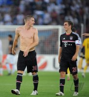 Fussball CHL  Saison 2011/2012: Bastian Schweinsteiger (FC Bayern Muenchen) und Philipp Lahm (FC Bayern Muenchen)