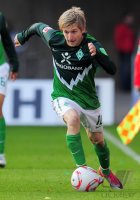 Fussball: 1. Bundesliga Saison 2010/2011: Bremen, MARIN am Ball