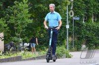 Oberbuergermeister Boris Palmer (Die Gruenen) auf einem E-Scooter