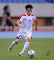 FUSSBALL INTERNATIONAL:  Mun In Guk  (Nordkorea)
