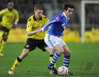 Fussball 1. Bundesliga : Lukasz Piszczek (li, Borussia Dortmund) gegen Jose Manuel Jurado (re, FC Schalke 04)
