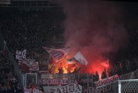 Fussball DFB Pokal 10/11 :  Bayern Fankurve mit einem Bengalischen Feuer