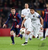 Fussball CHL  Saison 2014/2015: Thiago Silva (Paris Saint-Germain) gegen Lionel Messi (Barca)