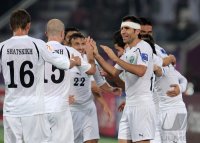 Fussball AFC Asian Cup 2011 Eroeffnungsspiel:  JUBEL Maksim Shatskikh , Aleksandr Geynrikh, Timur Kapadze (v. li., Uzbekistan)