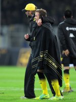 Fussball 1. Bundesliga, Saison 2011/2012: Trainer Juergen Klopp umarmt  Mario Goetze (v. li., Borussia Dortmund)