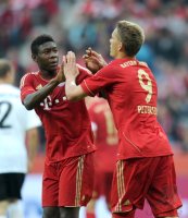 Fussball 1. Bundesliga : David Alaba , Nils Petersen (v. li., FC Bayern Muenchen)