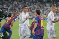 FUSSBALL International Primera Division/Super Cup 2011:  Cristiano Ronaldo (Real Madrid) und Lionel Messi (Barca)