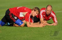 Fussball 1. Bundesliga Saison   2011/2012 : Holger Badstuber , Arjen Robben (v. li., FC Bayern Muenchen)