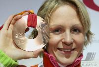 Olympische Spiele 2006 Turin - Biathlon Martina Glagow (GER) mit Medaille