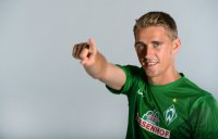 Fussball 1. Bundesliga, Saison 2012/2013, Werder Bremen: Nils Petersen im exklusiven Pressefoto ULMER Fotoshooting