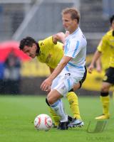 1. Fussball Bundesliga: Dimitar Rangelov  (li, BVB) gegen Stefan Aigner  (re, 1860 Muenchen)