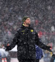 Fussball 1. Bundesliga : Trainer Juergen Klopp im Schneetreiben (Borussia Dortmund)